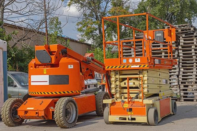 worker operating forklift in bustling warehouse environment in Morada